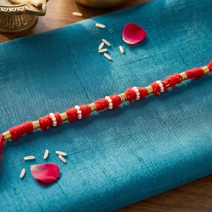 Handmade Red Bracelet Rakhi With White Beads (1 Pc)