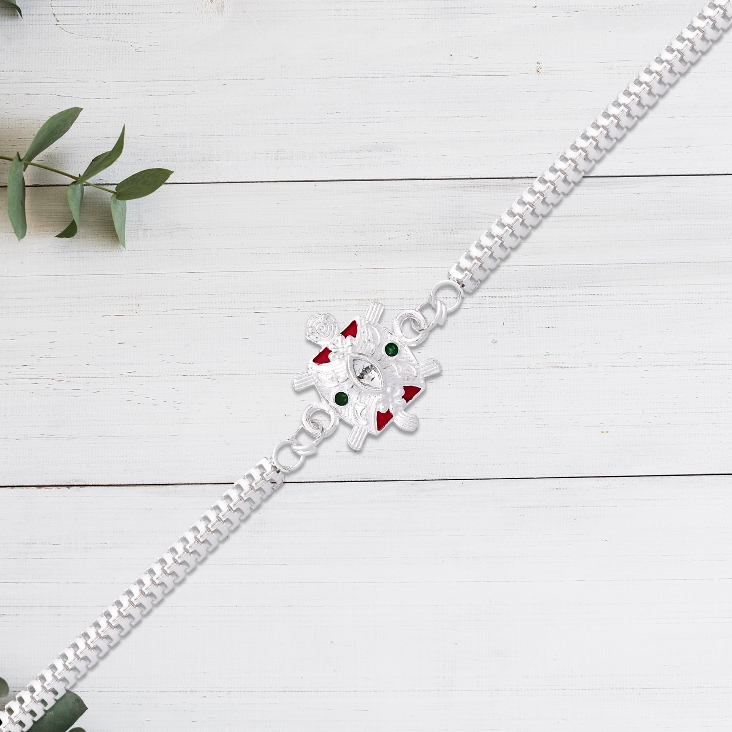 Designer Turtle Rakhi With Silver Finish And Enamel Highlights
