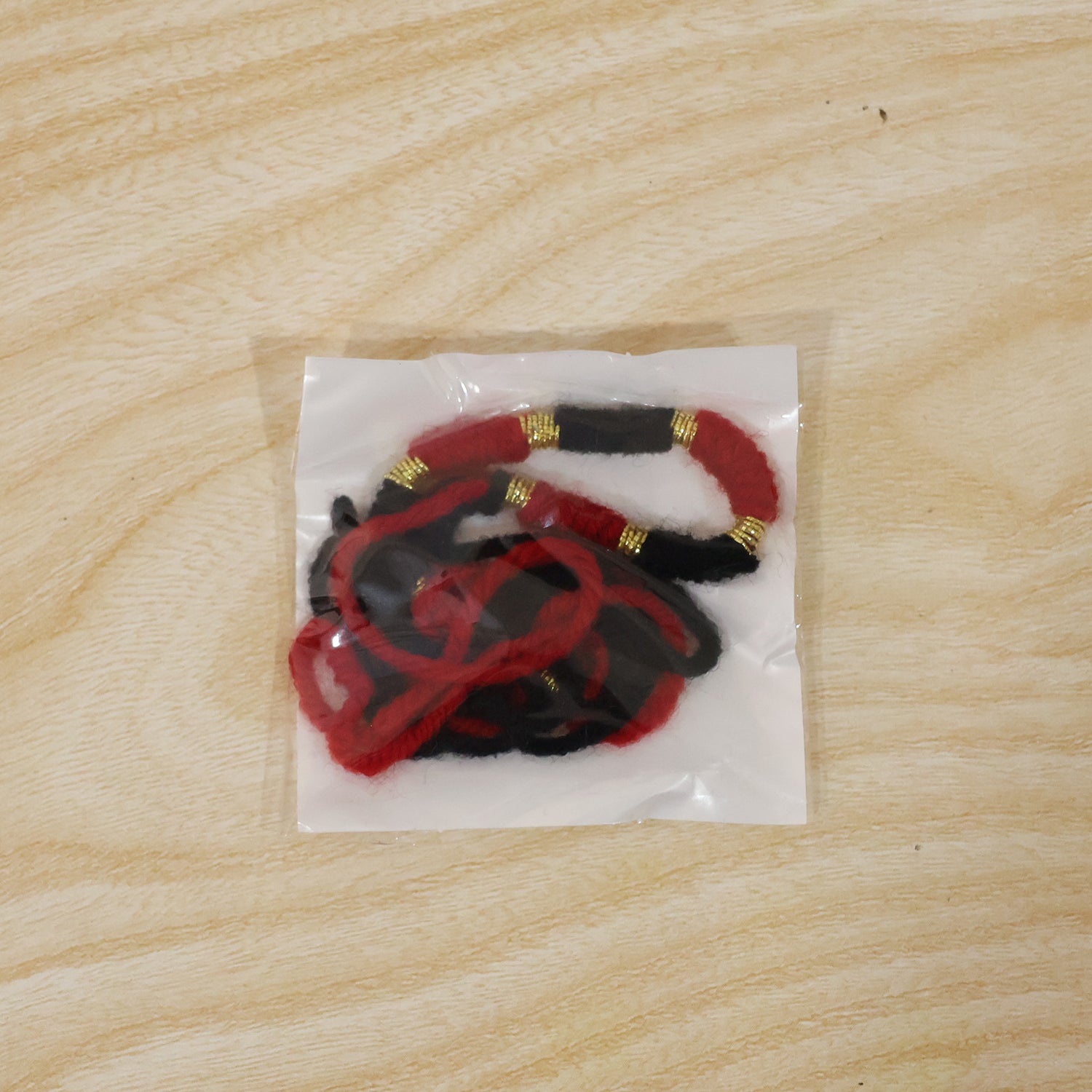 Handmade Black And Red Bracelet Rakhi For Brother (1 Pc)