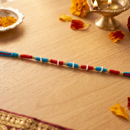 Handmade Blue And Red Thread Bracelet Rakhi (1 Pc)